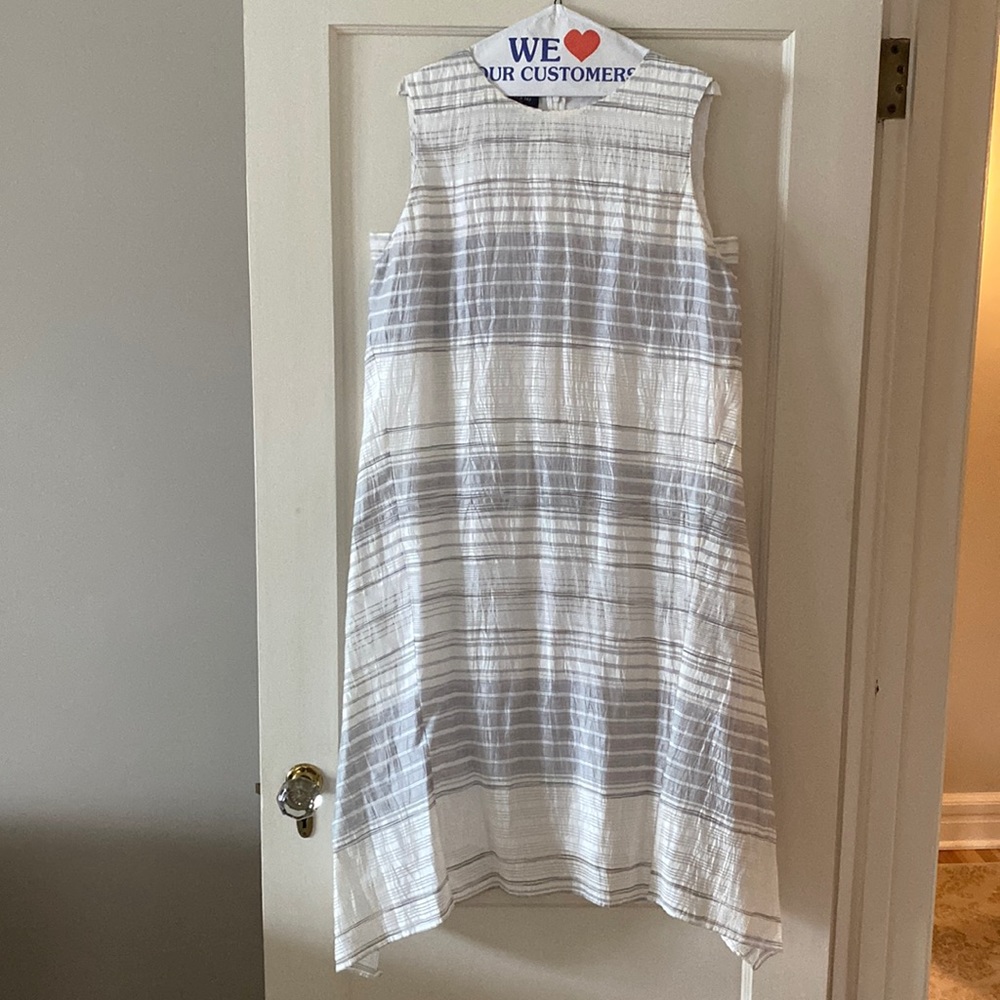 Lafayette 148 NY flowy dress.  Longer on the sides.  Fully lined.